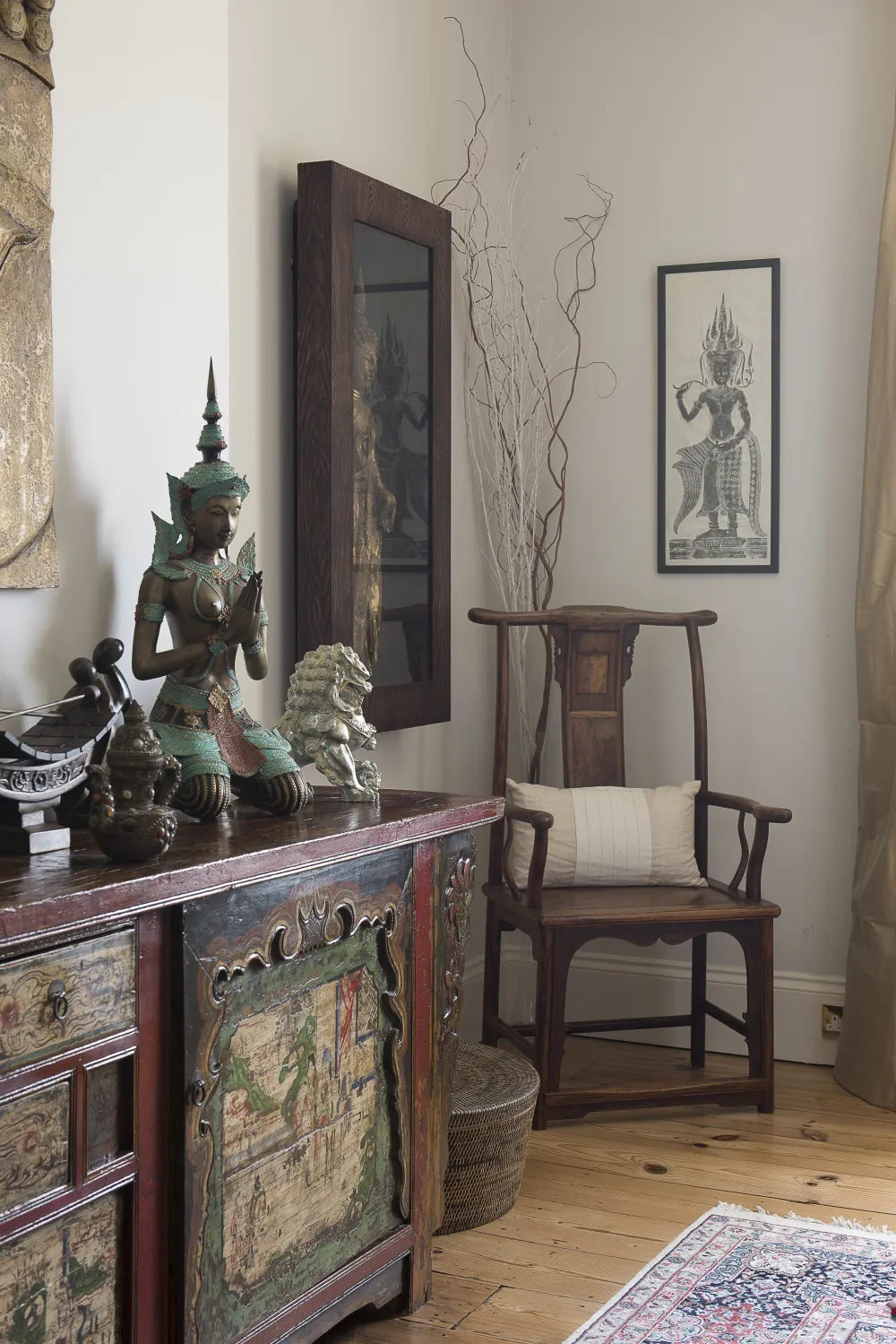 Asian-inspired room with Tibetan cabinet