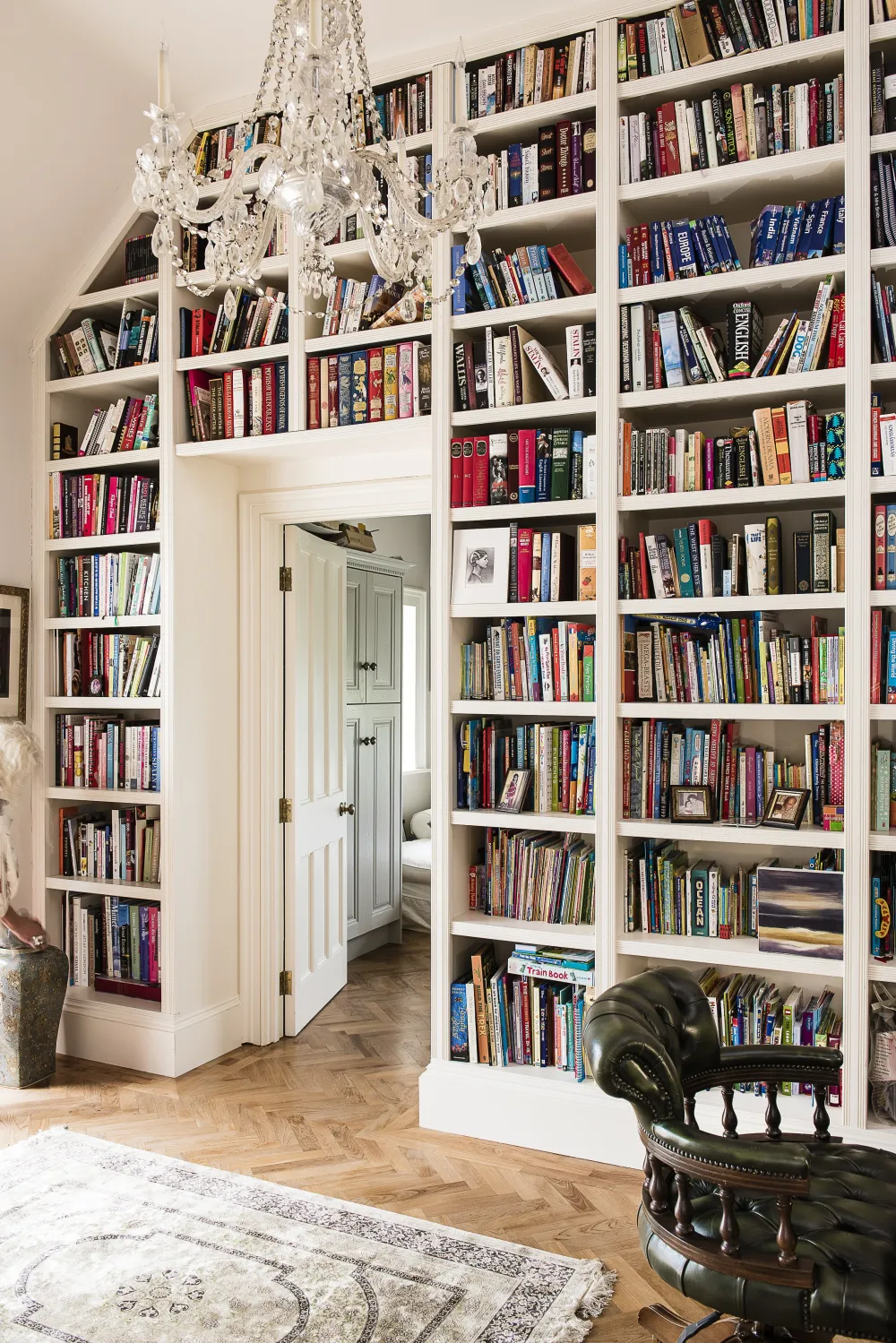 Full height library with door through to bedroom